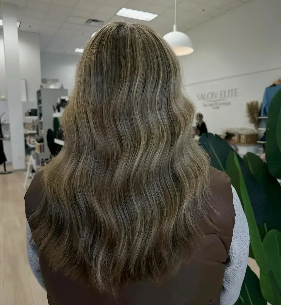 Soft brown-to-blonde balayage seen from behind